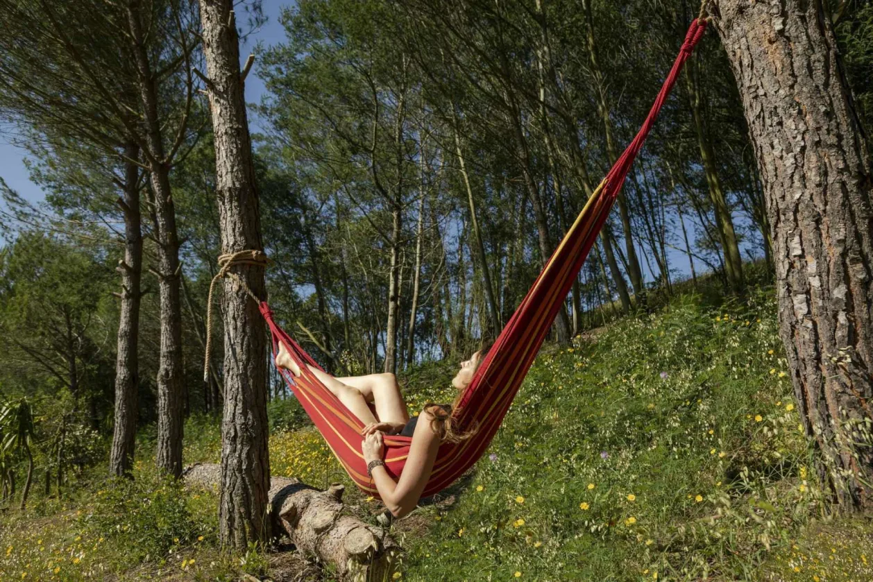 Woman relaxing on hammock at Quinta Camarena Portugal